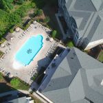 aerial view of building and pool