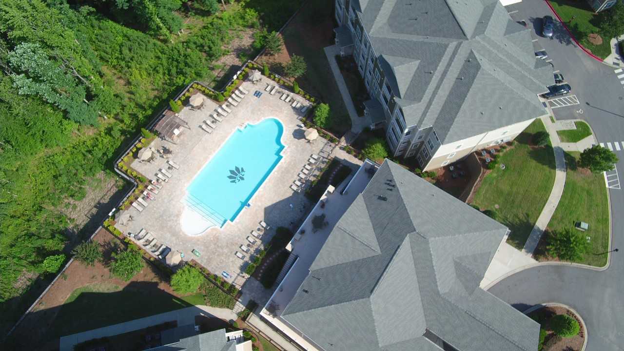 aerial view of building and pool