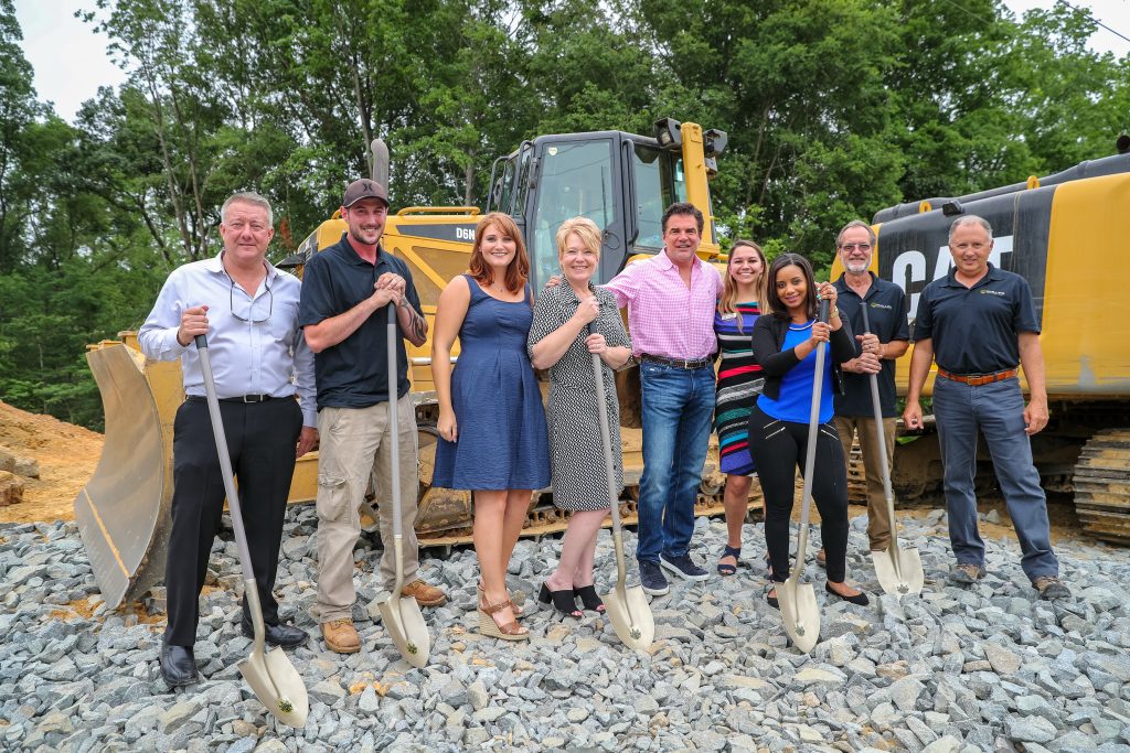 ground breaking with gold shovels