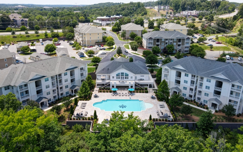 aerial view of apartment community and pool